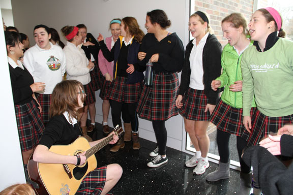 While waiting in the Windmoor Center during Activity 2 after the fire alarm was set off a second time, students sang Taylor Swifts Our Song and Jason Mrazs Im yours. They were led by guitarist Brianna Valine. 