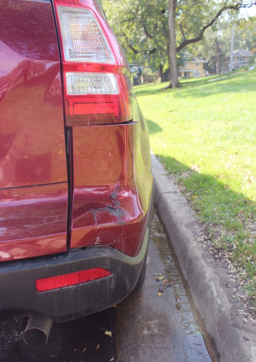 Junior Sophia Prochnow damaged her Honda in her driveway while attempting to back out. Her tailight is broken and the lower right side of her car is dented. photo courtesy of Sophia Prochnow