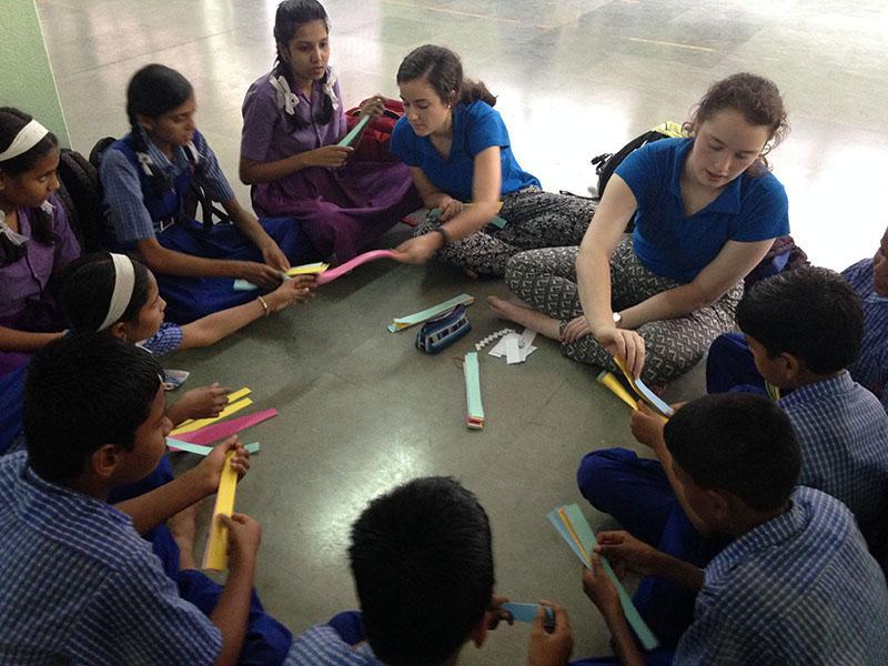 Meredith Raymer and her community service group in India help children attending a government school with spoken English. photo courtesy of Meredith Raymer
