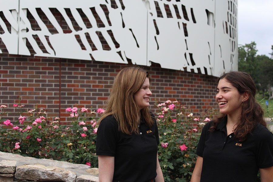 Senior transfers Jordan Trbizan, left, and Emma Zanher, right, laugh as they talk about their experiences at STA. photo by Meggie Mayer