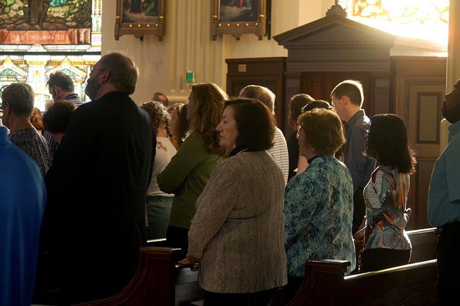 Church+attendees+rise+for+the+Gospel+at+the+Cathedral+of+the+Immaculate+Conception+Sept.+22.+Mass+was+held+to+commemorate+the+150+years+of+service+done+by+the+Sisters+of+St.+Joseph+of+Carondelet.+photo+by+Cassie+Hayes