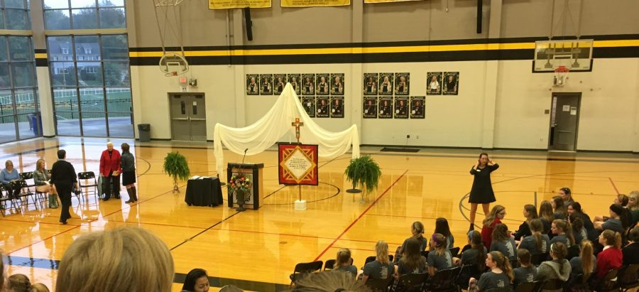 Students and faculty gather in the Goppert Center for the St. Teresa of Avila prayer service. photo by Cece Curran