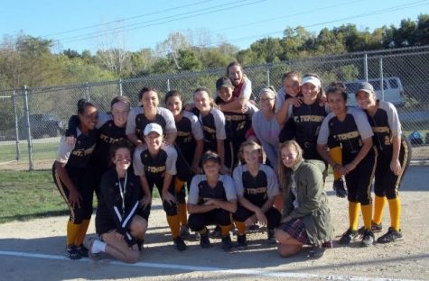 The STA softball team poses for a picture at the District semi-finals game. photo courtesy of Gabirelle Pesek