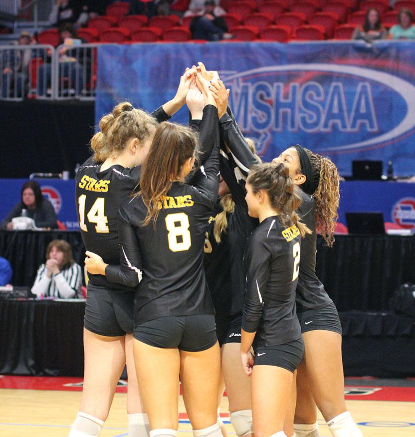 STA volleyball players huddle before a game at the volleyball state championship  in Cape Girardeau, Missouri on Oct. 28. photo courtesy of Catelyn Campbell
