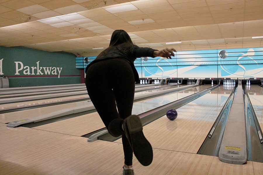 Junior Megan Cotter bowls at Father-Daughter Bowling Night Jan. 8. photo by Meghan Baker