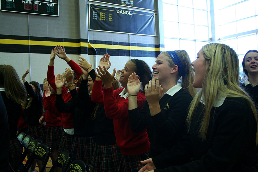 Seniors sing and dance in the gym at the Passing of the Legacy ceremony, Aug. 17. photo courtesy of Caroline Reynolds