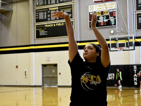 Senior, Hailey Coleman, shoots the first day of basketball tryouts Oct. 30. Coleman is the only senior trying out this season. 
