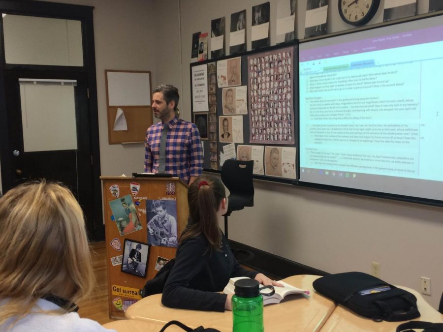 English teacher Kelly Fast teaches AP literature students in his classroom Dec. 5. Fast was the head of the interim week committee before it was cancelled. photo by Annabelle Meloy