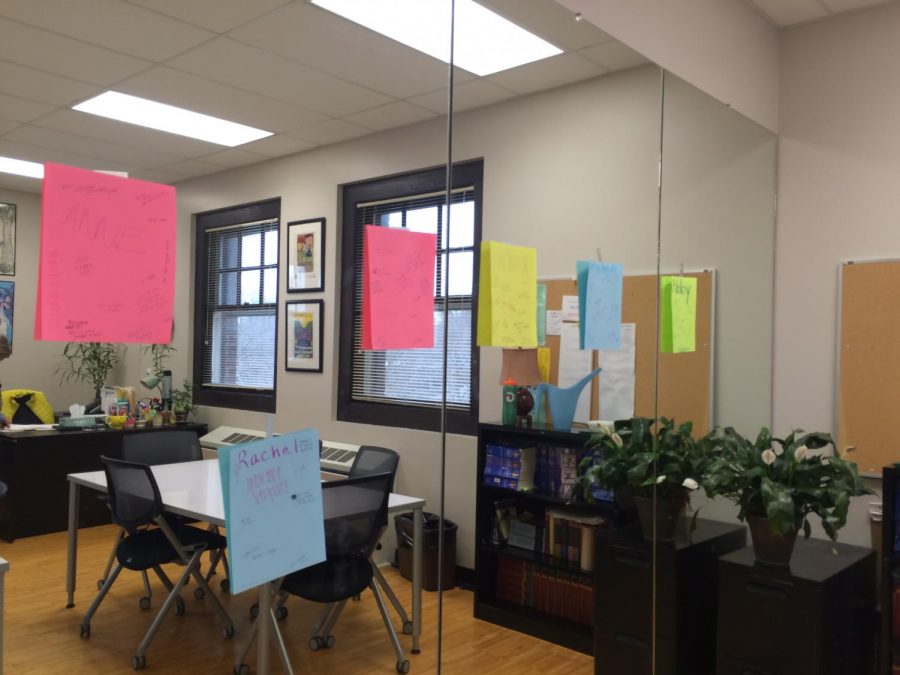 Colorful sheets of paper with positive affirmations hang on the mirrors in M301 March 21. One reads you are always so confident. photo by Julia Kerrigan