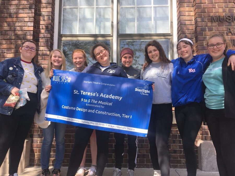 Costume crew of Nine to Five was nominated for the Blue Star award April 26. The banner was revealed by drama teacher Shana Prentiss at the steps of the M&A Building. photo courtesy of Shana Prentiss 
