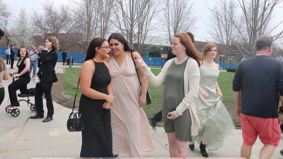 Writer Reagan Penn interviews senior Orion Martinez-Ballard and Anna Kate Powell at Pre Prom on the quad April 13. Seniors gathered in the quad to take pictures before prom. photo by Trang Nguyen