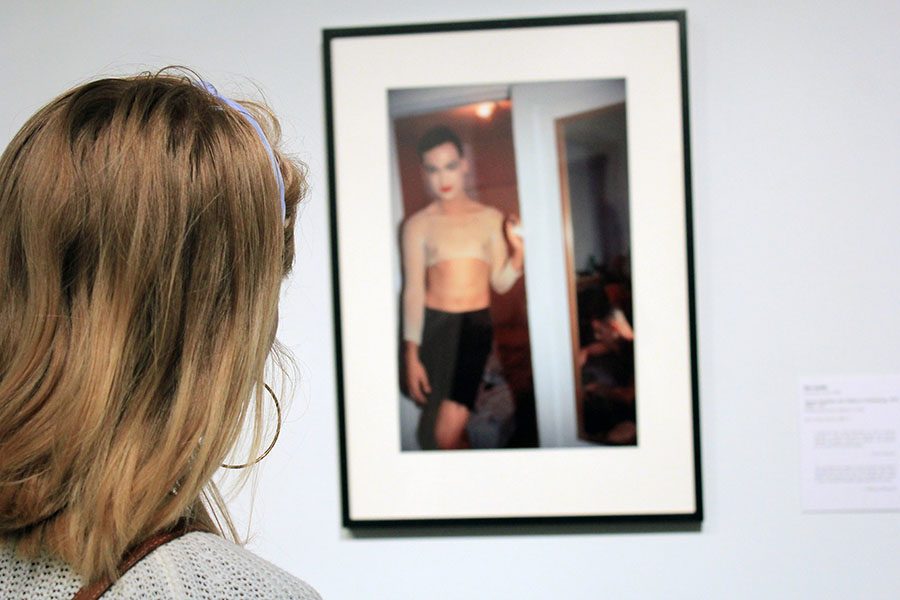  Sophomore Maggie Dodderidge admires a peice by Nan Goldin on Aug. 18. The piece is titled Jimmy Paulette and Tabboo! Undressing, NYC, 1991 (1991). photo by Beatrice Curry