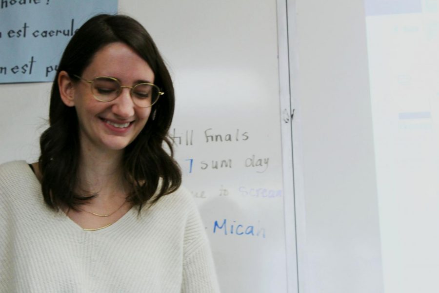 Latin teacher Amanda Hawley laughs at a students joke Nov. 8. Hawley teaches freshman, sophomores, juniors and seniors. photo by Tess Jones