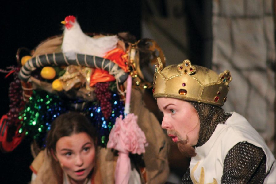 Senior Margaret Jordahl announces “Act Three” as King Arthur in Monty Python’s Spamalot Nov. 5. Senior Lauren Daugherty corrects that it is “Act Two.” photo by Olivia Powell