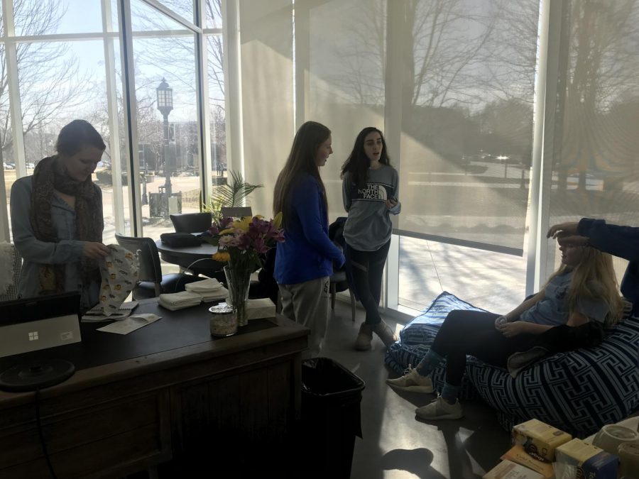 Mrs.+Arredondo+and+students+Holly+Phalen%2C+Sasha+Blair+and+Claire+Wunder+have+a+discussion+about+faith+Feb.1.+photo+by+Kendall+Lanier