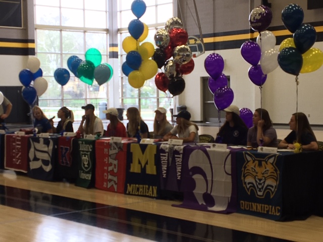 Seniors sit during their signing ceremony in the gym April 17. Ten seniors this year were a part of the signing ceremony. photo by Annabelle Meloy