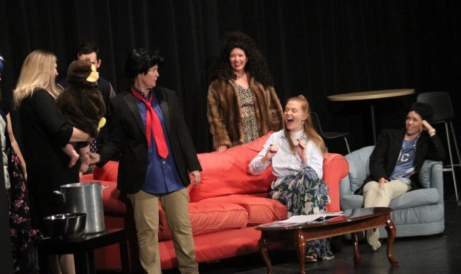 The cast, comprised of teachers and faculty, all turn to stare at English teacher Kate Absher acting as Phoebe Buffay Sept. 19. The skit was inspired by the popular 90s sitcom “Friends.” photo by Faith Andrews-O’Neal