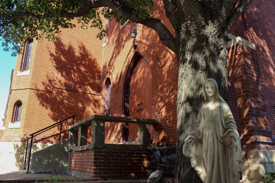  A statue sits outside of St. Mary’s Church Aug. 23. The Episcopalian church was built in 1886 and supposedly haunted by Father Jardine, who started the church. photo by Ella Norton 