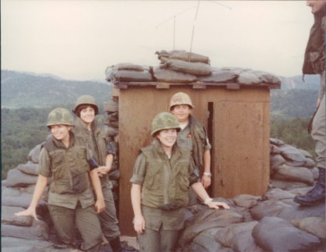 Mary Cox stands next to fellow nurses in a demilitarized zone in 1978. photo courtesy of Mary Cox