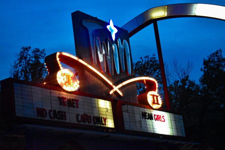 The Twin Drive-In Theater sign lights up showing what movies it is playing Sept. 26. Mean Girls and Tenet were the last two movies the theater showed this year. photo by Lucy Doerflinger