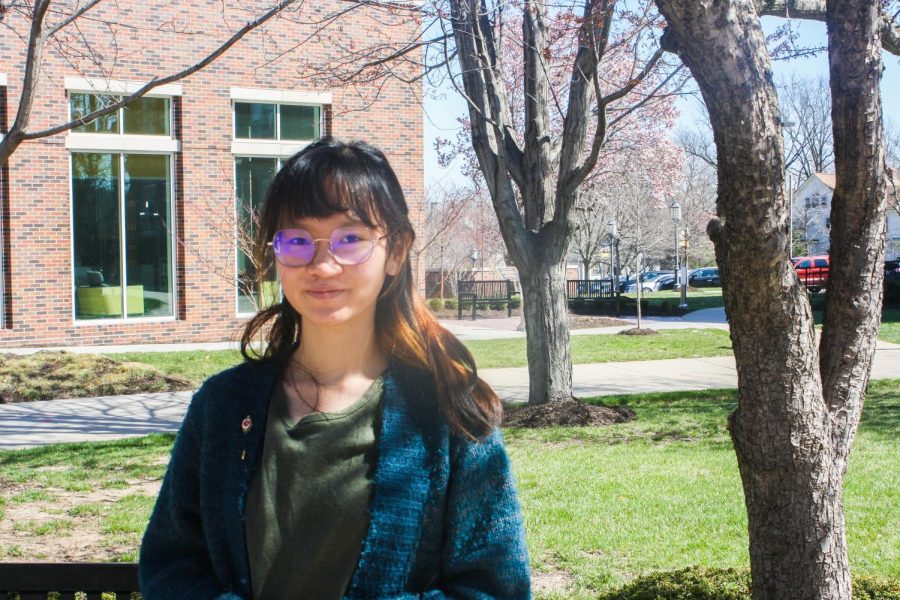 Senior Lia Uhlenhuth,a member of Asian-Affinity, in the quad April 5. She has been politically active all over social media since the Atlanta shooting. photo by Kyra Fieger 