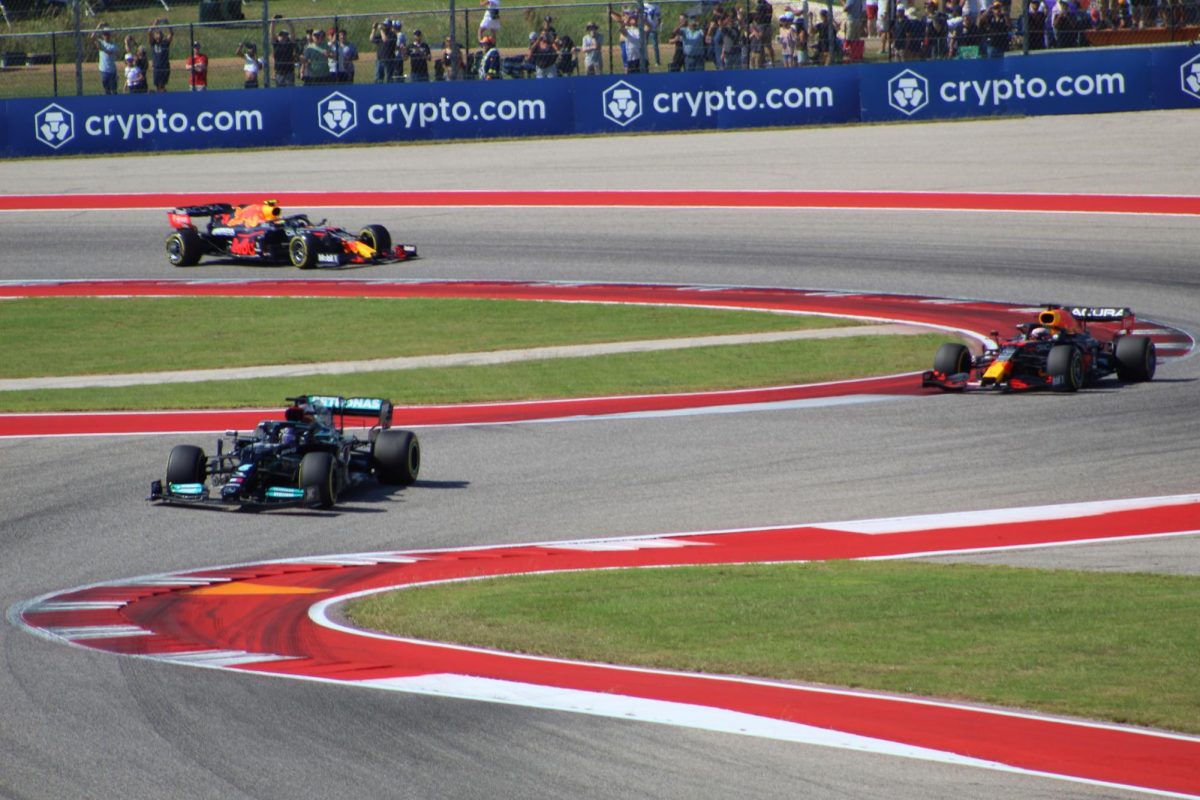 Racers competing on the Circuit of the Americas, in the 2021 United States Grand Prix.