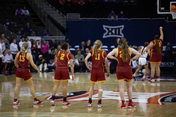 While Crooks shoots a free throw, Arianna Jackson, Emily Ryan, Hannah Belanger and Addy Brown prepare for the next play. 